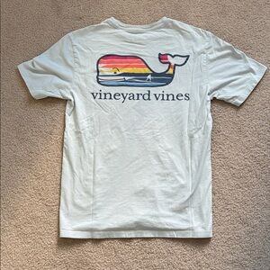 Vineyard Vines Light Blue Shirt with Surf Graphic on Front Pocket and Back
